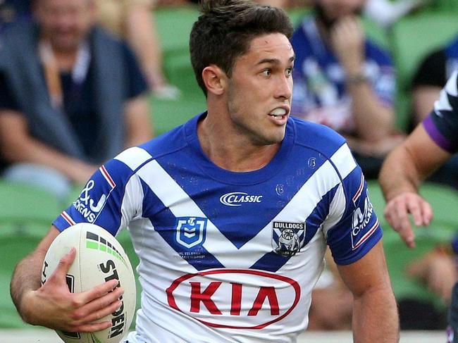 Nick Meaney of the Bulldogs runs the ball forward during the Round 4 NRL match between the Melbourne Storm and Canterbury Bulldogs at AAMI Park in Melbourne, Sunday, April 7, 2019. (AAP Image/Hamish Blair) NO ARCHIVING, EDITORIAL USE ONLY