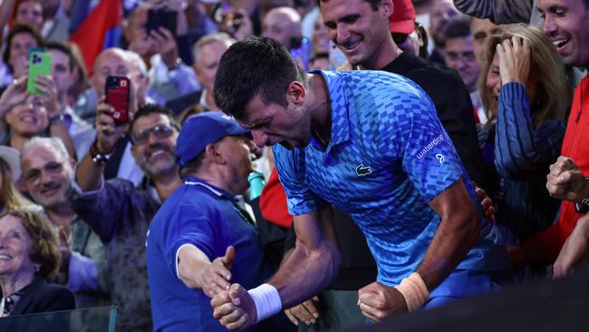 Novak Djokovic let it all go. Photo by DAVID GRAY / AFP.