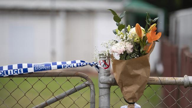 Flowers are left in tribute as investigations continue into a fatal house fire in Wallace St, Newtown, Saturday, June 1, 2024. Picture: Kevin Farmer