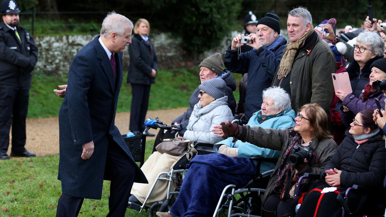 One royal fan was seen reaching for Prince Andrew during the walk. Picture: Stephen Pond/Getty Images.