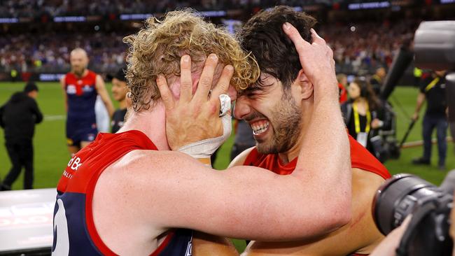 PERTH, AUSTRALIA - SEPTEMBER 25: Clayton Oliver of the Demons and Christian Petracca of the Demons celebrate during the 2021 Toyota AFL Grand Final match between the Melbourne Demons and the Western Bulldogs at Optus Stadium on September 25, 2021 in Perth, Australia. (Photo by Dylan Burns/AFL Photos via Getty Images)