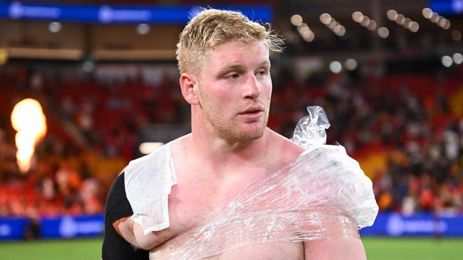 Prop Thomas Flegler ices his injured shoulder after the Dolphins v Tigers clash at Suncorp Stadium. Picture: NRL Images