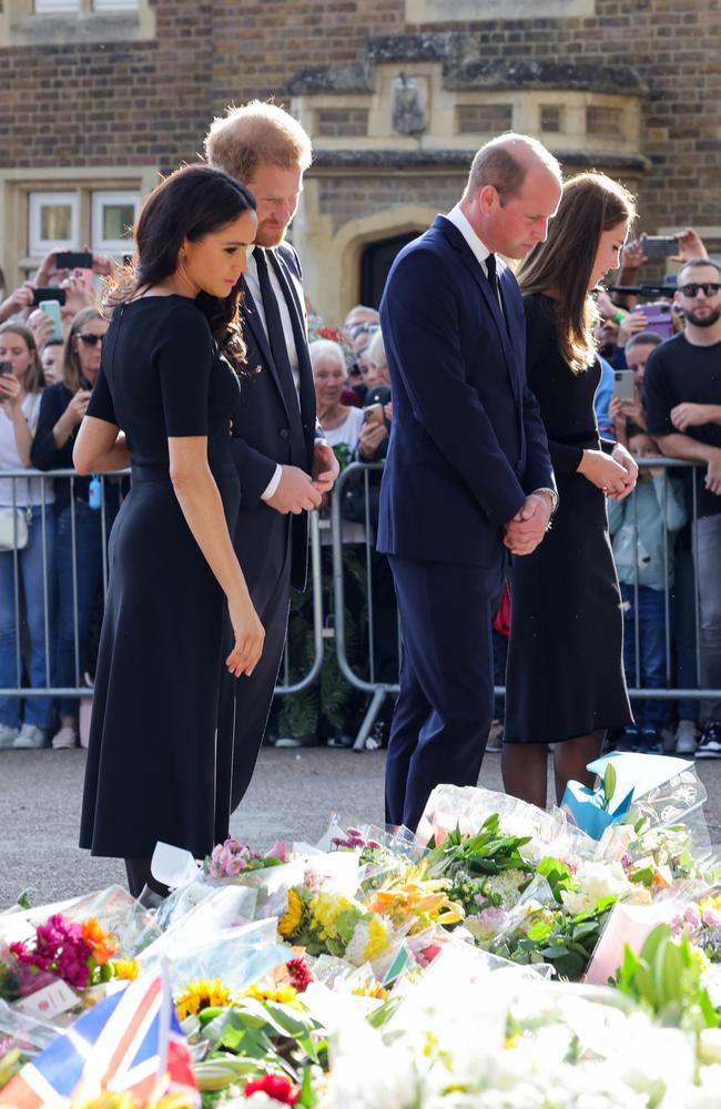 The two royal couples view the tributes to the Queen. Chris Jackson – WPA Pool/Getty