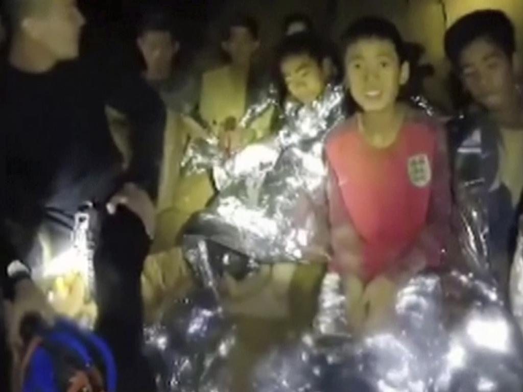 Thai boys with Navy SEALs inside a cave during the famous rescue. Picture: AP