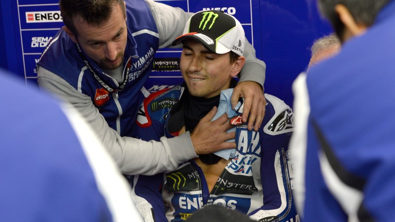 Lorenzo is tended to prior to the race. Picture: Yamaha Racing