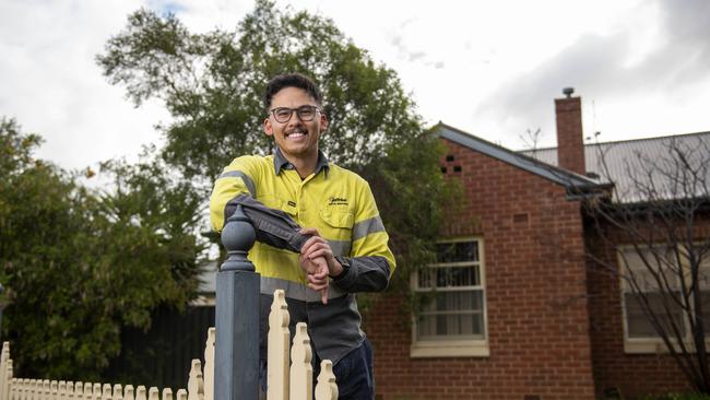 Joshua Craven outside the Kilburn home he is currently renting. The house on 42 Goodman Ave, Kilburn has now been listed for sale. The suburb has topped the list for the most affordable suburbs boasting proximity to the city. Picture: Naomi Jellicoe