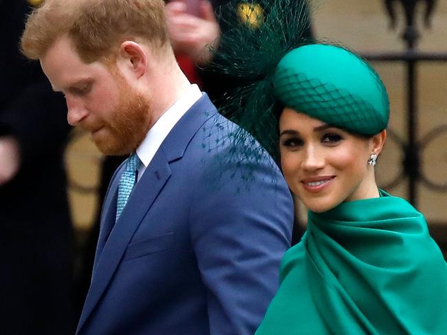 (FILES) In this file photo taken on March 9, 2020 Britain's Prince Harry, Duke of Sussex, (L) and Meghan, Duchess of Sussex arrive to attend the annual Commonwealth Service at Westminster Abbey in London. - Prince Harry and his wife Meghan blacklisted four major British tabloids on April 19, 2020, accusing them of publishing stories that were "distorted, false and invasive beyond reason", UK media reported. In a scathing letter to the editors of the Sun, Daily Mail, Mirror and Express, the couple, who have formally stepped down as senior members of the British Royal family, said there would be "no corroboration and zero engagement" with the newspapers, the Guardian said. (Photo by Tolga AKMEN / AFP)