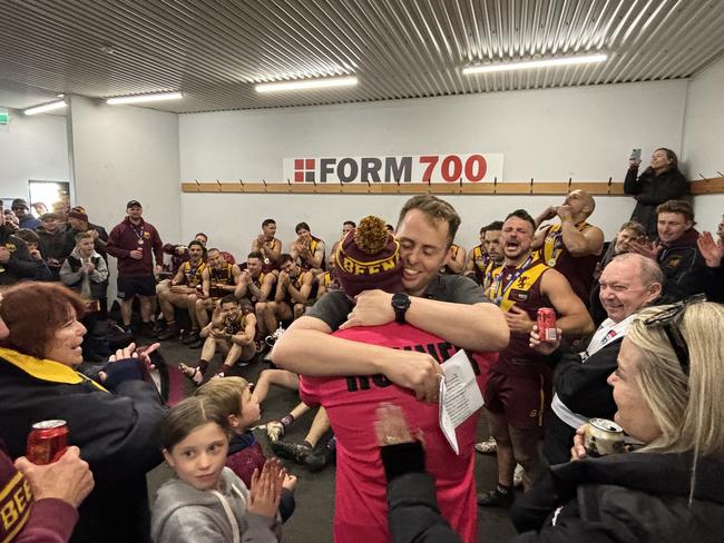 Michael Kinsella shares a hug with good mate and former coach Liam Wilson. Picture: Tyler Lewis