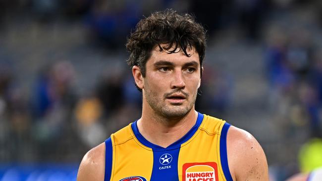 PERTH, AUSTRALIA - JUNE 08: Tom Barrass of the Eagles unhappy after the loss during the 2024 AFL Round 12 match between the West Coast Eagles and the North Melbourne Kangaroos at Optus Stadium on June 08, 2024 in Perth, Australia. (Photo by Daniel Carson/AFL Photos via Getty Images)