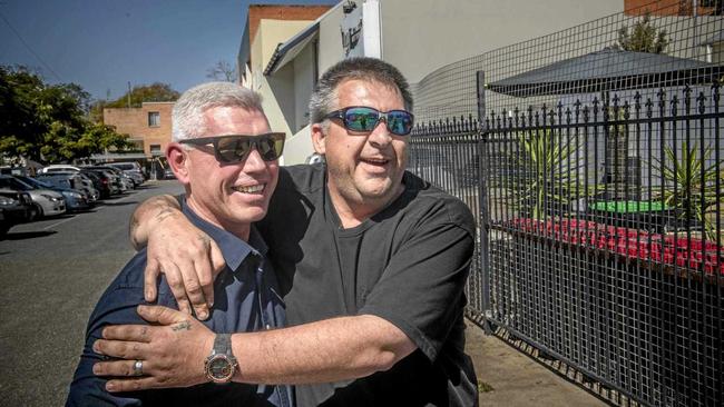 Mark Rae gets a hug from Gerry Reside as they met for the first time since Mark saved Gerry's life after a heart attack. Picture: Adam Hourigan