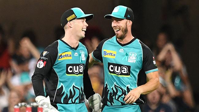 Brisbane Heat captain Jimmy Peirson (left) saw signs of the old Chris Lynn in his swashbuckling innings against the Melbourne Stars. Picture: AAP