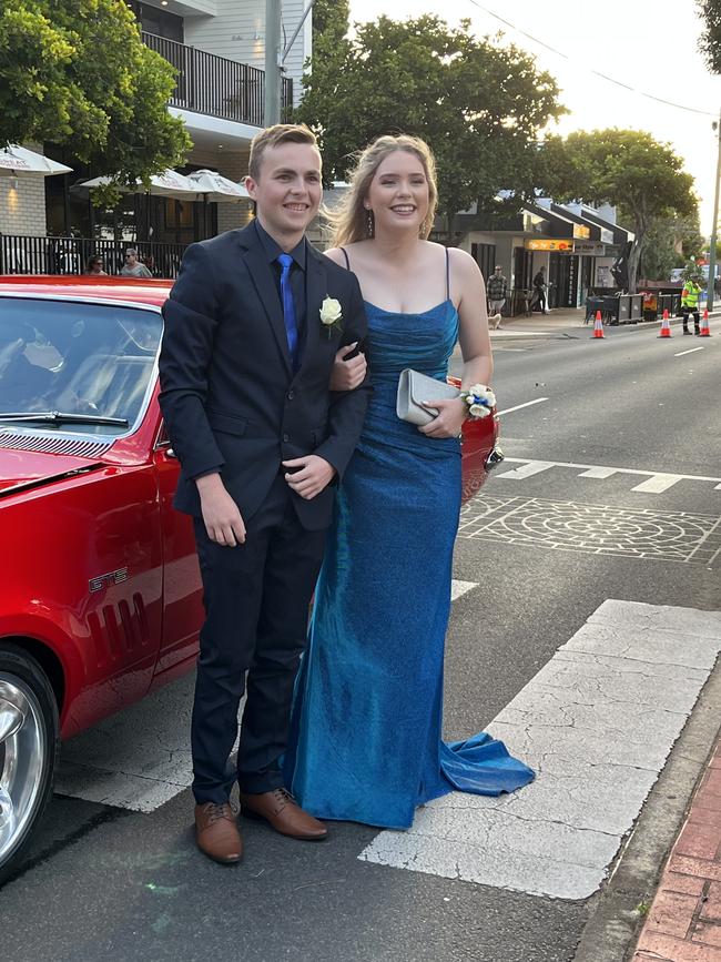 Zac Tyson and Madison Zanella arrive at the formal in a 1960 Monaro.