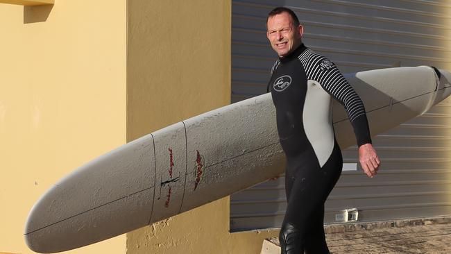 Liberal Party donors could end up riding waves and eating lunch with ex-Prime Minister Tony Abbott if they win the raffle’s first prize. Picture: John Grainger