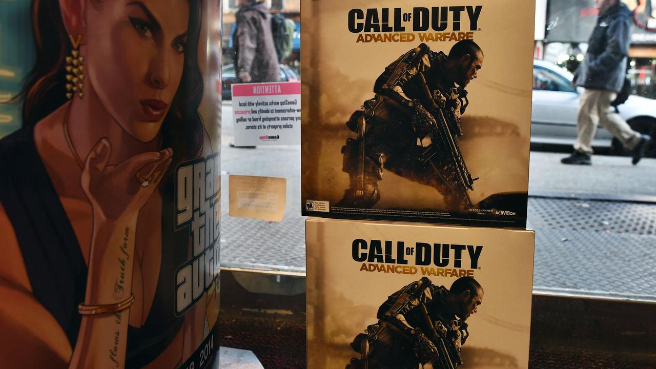 Playing violent video games like Call of Duty can feel ‘safer’ for boys than facing the uncertainty of the world and their futures. Picture: AFP