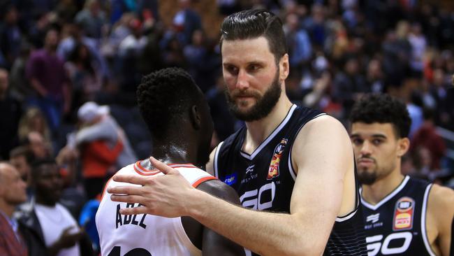 TORONTO, ON - OCTOBER 5: Deng Adel #12 of the Toronto Raptors is congratulated by Alex Pledger #35 of Melbourne United following the second half of an NBA preseason game at Scotiabank Arena on October 5, 2018 in Toronto, Canada. NOTE TO USER: User expressly acknowledges and agrees that, by downloading and or using this photograph, User is consenting to the terms and conditions of the Getty Images License Agreement.   Vaughn Ridley/Getty Images/AFP == FOR NEWSPAPERS, INTERNET, TELCOS & TELEVISION USE ONLY ==