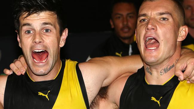 AFL: Round 3, Richmond V West Coast Eagles at the Melbourne Cricket Ground (M.C.G.) 8th April, Richmond's Trent Cotchin and Dustin Martin sing the song. Picture: George Salpigtidis