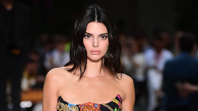 US model Kendall Jenner is one of the many Instagram influences to pose with Barbie feet. Picture: Miguel Medina/AFP