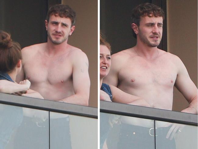 Paul Mescal soaks up the sunshine from his hotel balcony in Sydney.