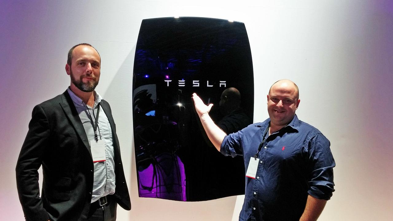 Evan Beaver (left) from Tesla and Chris Williams, CEO of Tesla Powerwall battery installer Natural Solar. Picture: supplied