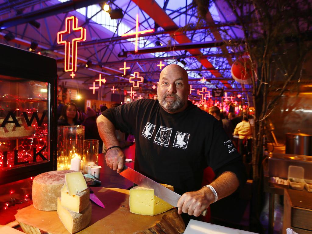 The final night of Dark MOFO winter feast saw large crowds putting stall holders under the pump. (L-R) Nick Haddow of The Bruny Island Cheese Company at the feast. Picture: MATT THOMPSON