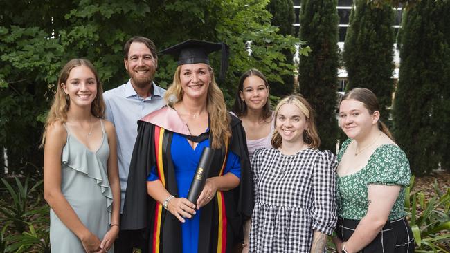 Bachelor of Education (Primary) graduate Sarah Johns with (from left) Steph Johns, Reese Johns, Chloe Johns, Chelsea Lasserre and Jessica Livingstone at a UniSQ graduation ceremony at Empire Theatres, Tuesday, February 13, 2024. Picture: Kevin Farmer