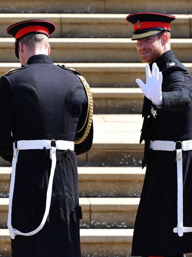 The brothers looked relaxed as they arrived. Picture: AP