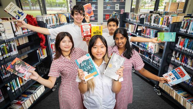 St Albans Secondary College students Stephanie Truong, Angelina Huynh, Neha Sivakumar, Mitchell Cauchi, and Julien Kanwar celebrate their school’s results. Picture: Mark Stewart