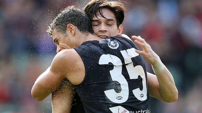 Ed Curnow hugs Zac Fischer after a goal. Picture: Michael Klein