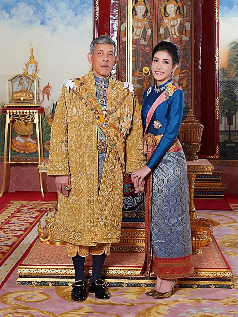 Thailand's King Maha Vajiralongkorn poses with then-royal noble consort Sineenatra Wongvajirapakdi. Picture: Thailand’s royal office/AFP