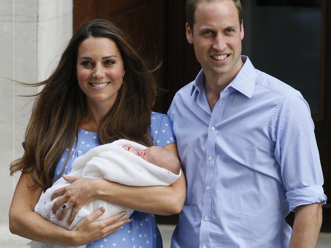 Prince William and Kate, Duchess of Cambridge pose with the Prince of Cambridge outside St. Mary's Hospital in London. Picture: AP/Kirsty Wigglesworth