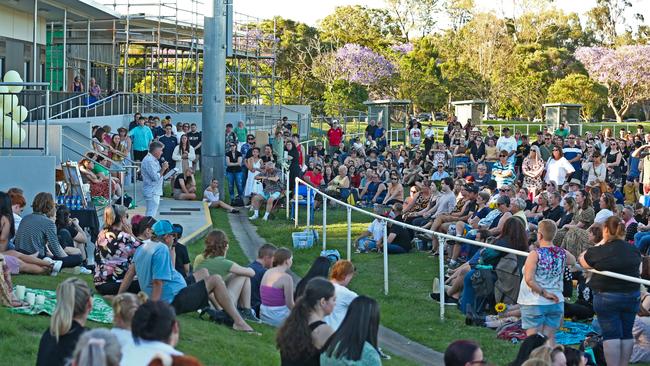 People gather at Rob Akers Reserve for the candlelight vigil for Emily Thompson. Picture: Zak Simmonds