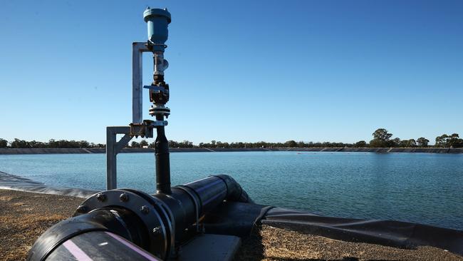 A pipe runs into a holding pond at Santos’ Leewood water treatment facility in Narrabri, NSW. Picture: Getty Images