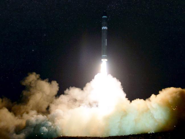 TOPSHOT - CORRECTION - This photo taken on November 29, 2017 and released on November 30, 2017 by North Korea's official Korean Central News Agency (KCNA) shows launching of the Hwasong-15 missile which is capable of reaching all parts of the US.  / AFP PHOTO / KCNA via KNS / KCNA VIA KNS /  - South Korea OUT / REPUBLIC OF KOREA OUT   ---EDITORS NOTE--- RESTRICTED TO EDITORIAL USE - MANDATORY CREDIT "AFP PHOTO/KCNA VIA KNS" - NO MARKETING NO ADVERTISING CAMPAIGNS - DISTRIBUTED AS A SERVICE TO CLIENTS THIS PICTURE WAS MADE AVAILABLE BY A THIRD PARTY. AFP CAN NOT INDEPENDENTLY VERIFY THE AUTHENTICITY, LOCATION, DATE AND CONTENT OF THIS IMAGE. THIS PHOTO IS DISTRIBUTED EXACTLY AS RECEIVED BY AFP.  / “The erroneous mention[s] appearing in the metadata of this photo by KCNA VIA KNS has been modified in AFP systems in the following manner: [Hwasong-15 missile] instead of [Hwansong-15 missile]. Please immediately remove the erroneous mention[s] from all your online services and delete it (them) from your servers. If you have been authorized by AFP to distribute it (them) to third parties, please ensure that the same actions are carried out by them. Failure to promptly comply with these instructions will entail liability on your part for any continued or post notification usage. Therefore we thank you very much for all your attention and prompt action. We are sorry for the inconvenience this notification may cause and remain at your disposal for any further information you may require.”