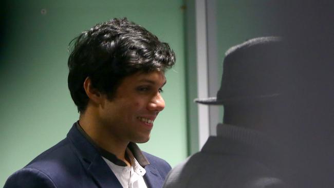 Kamer Nizamdeen pictured in Gordon police station checking in as part of his bail conditions in September, 2018. before al charges against him were dropped. Picture: Damian Shaw