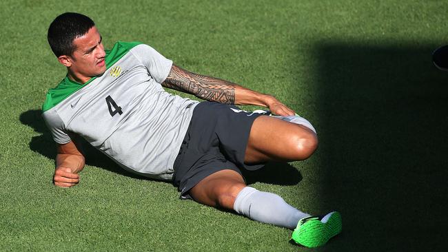 NEWCASTLE, AUSTRALIA - JANUARY 25: Tim Cahill stretches during an Australian Socceroos Asian Cup training session at Cooks Hill No.2 Sports Ground on January 25, 2015 in Newcastle, Australia. (Photo by Tony Feder/Getty Images)