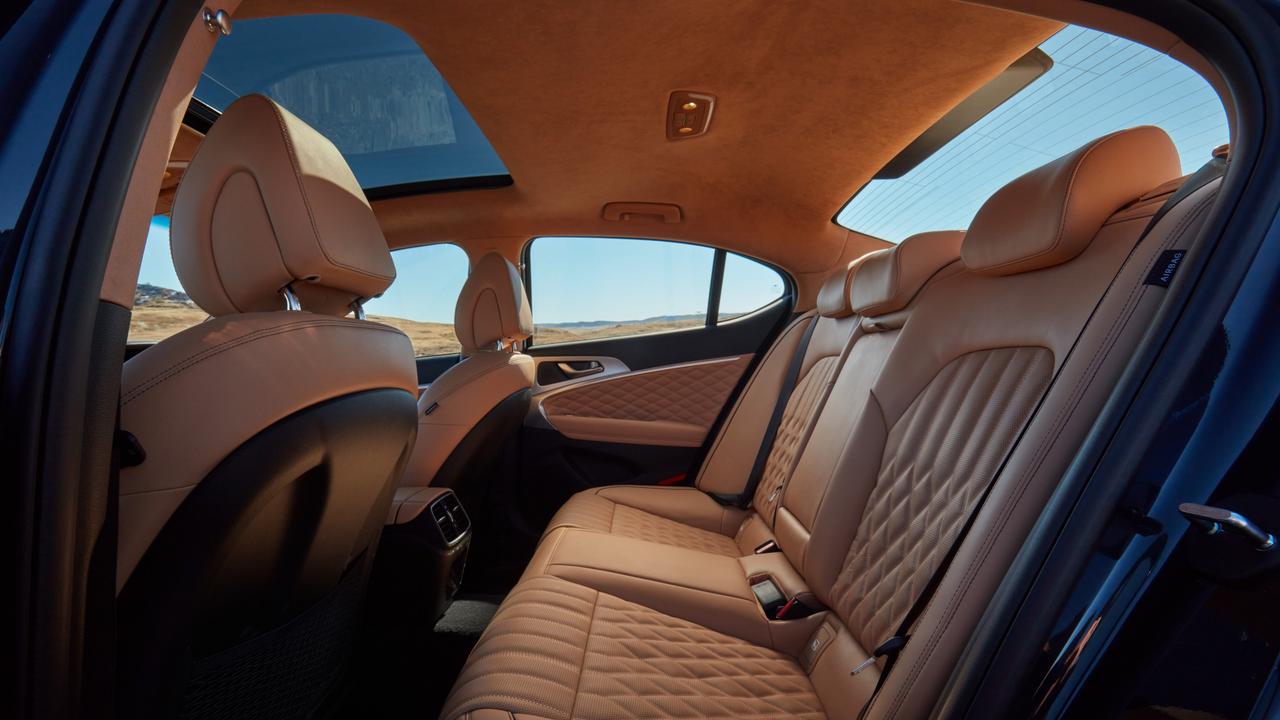 Standard features in a 2021 Genesis G70 Lux includes a suede headliner and sunroof.