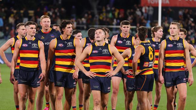 ADELAIDE, AUSTRALIA - JUNE 06: Crows players after the loss during the 2024 AFL Round 13 match between the Adelaide Crows and the Richmond Tigers at Adelaide Oval on June 06, 2024 in Adelaide, Australia. (Photo by Sarah Reed/AFL Photos via Getty Images)