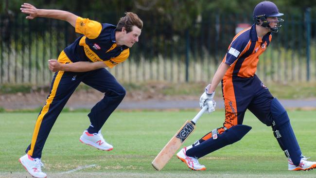 West Torrens bowler Isaac Johnson bowls past Northern Districts Jake Hartigan in the opening round of the premier league cricket season. Picture: Brenton Edwards/AAP