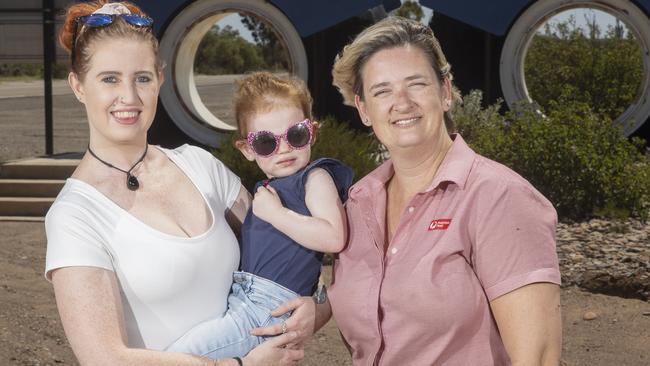 Kimmie Geyer and her daughter Gypsy and Tammy Tarr at the entrance to Leigh Creek. Picture: Simon Cross