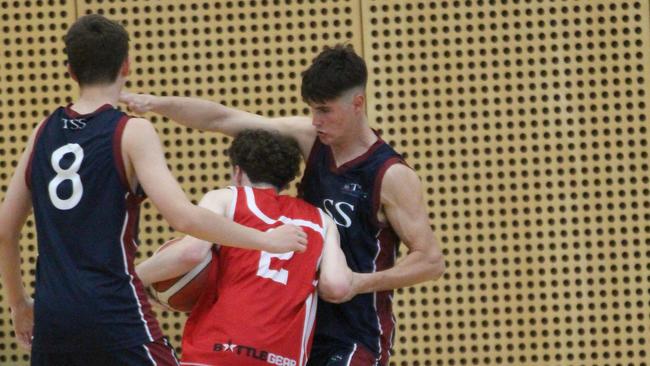 McCabe playing defence. CBSQ Day 1 boys action between Ipswich Grammar and TSS.