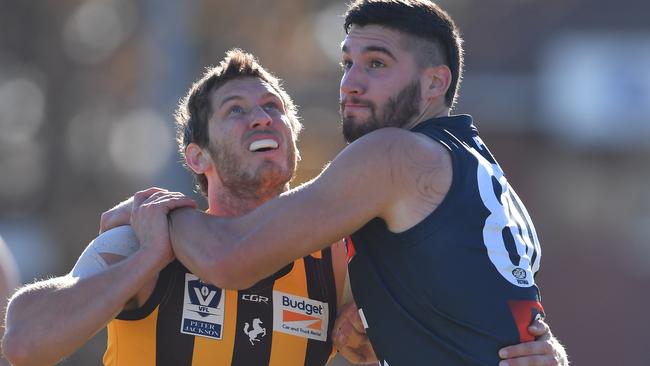 Tyrone Vickery battles Matthew Korcheck in the VFL this season.