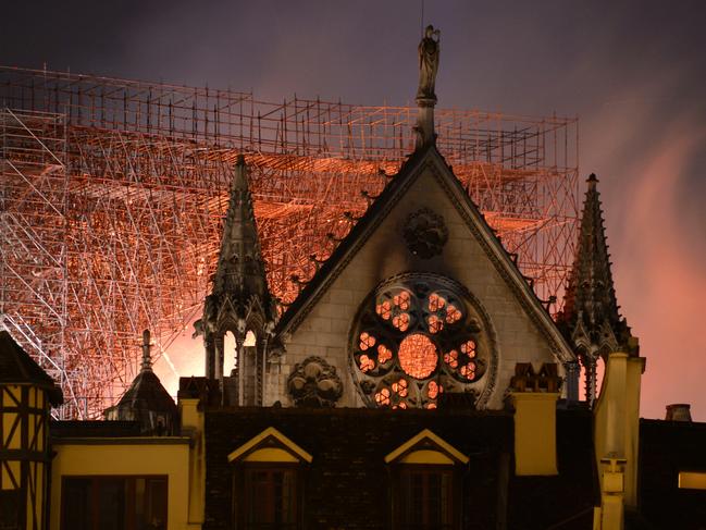 Smoke and flames rise during a fire at the landmark Notre-Dame Cathedral in central Paris, France on April 15, 2019. Photo by Aurore Marechal/ABACAPRESS.COMA/AAP