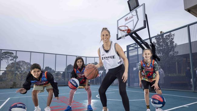 Australian Basketballer Bec Cole at the launch of the new basketball court at Westfield Knox. Pictured with kids from the Koorie Academy Basketball Ricky, Jade and Hunter. Picture: Wayne Taylor.