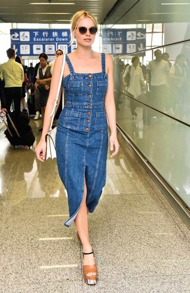 Margot Robbie walks towards the exit after landing at the Beijing Capital International Airport on July 7, 2016 in China. Picture: AAP