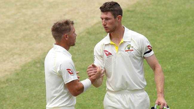 David Warner, left, embraces Cameron Bancroft. Picture: Getty Images.