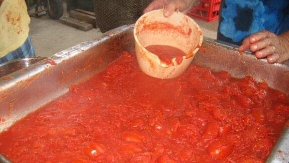 Tomatoes – 200 kilos of then – bubbling away at Lisa Mayoh's family 'National Wog Day'.