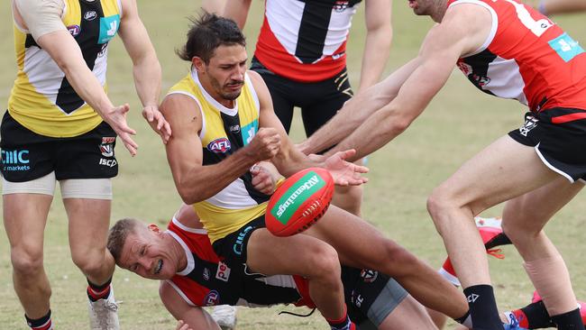 Hannebery tackles Ben Long. Picture: Michael Klein