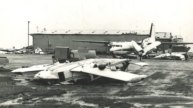 Light aircraft scattered about the tarmac at Darwin Airport. This picture appeared on page 4 of The Australian on Friday, December 27, 1974. Picture: Bob Seary