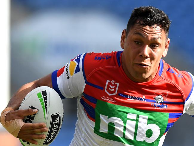 GOLD COAST, AUSTRALIA - APRIL 21: Jesse Ramien of the Knights breaks away from the defence during the round 6 NRL match between the Titans and the Knights at Cbus Super Stadium on April 21, 2019 in Gold Coast, Australia. (Photo by Bradley Kanaris/Getty Images)