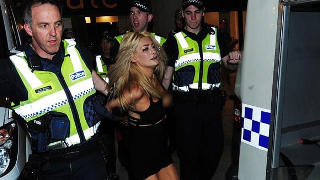 Stripper charged over nude romp in corporate box at AFL 